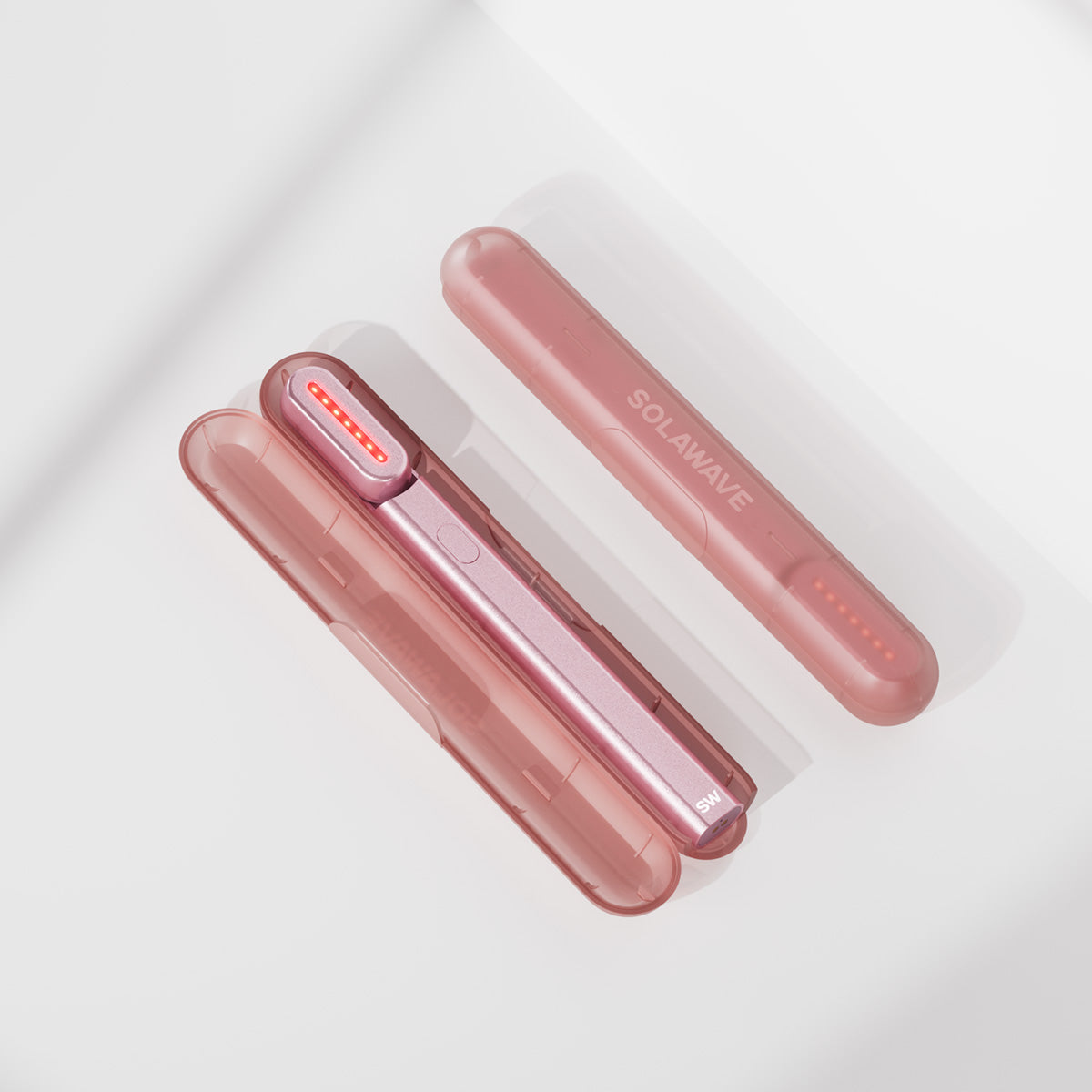 An image of a Solawave red light therapy wand inside a travel case || Rose Gold