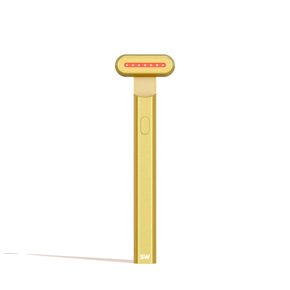 The Solawave 4-in-1 Radiant Renewal Skincare Wand with Red Light Therapy features a flat rectangular gold top and power button, emitting red LED light to reduce fine lines and boost skin radiance in your routine.