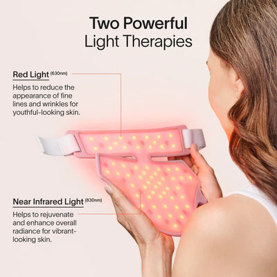 An image of a woman holding up a red light therapy device for neck and chest